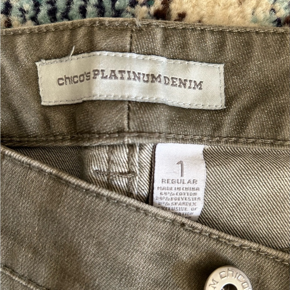Chico flare bottom jeans. Never worn. Gray/ green color. Size 1